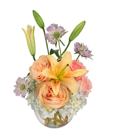 Fresh garden-style vase arrangement with colorful seasonal flowers