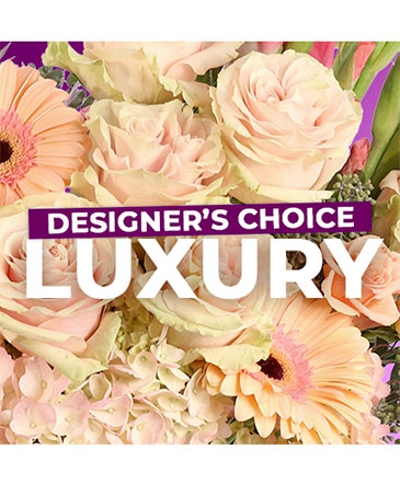 Premium luxury flower arrangement featuring roses, lilies, and orchids